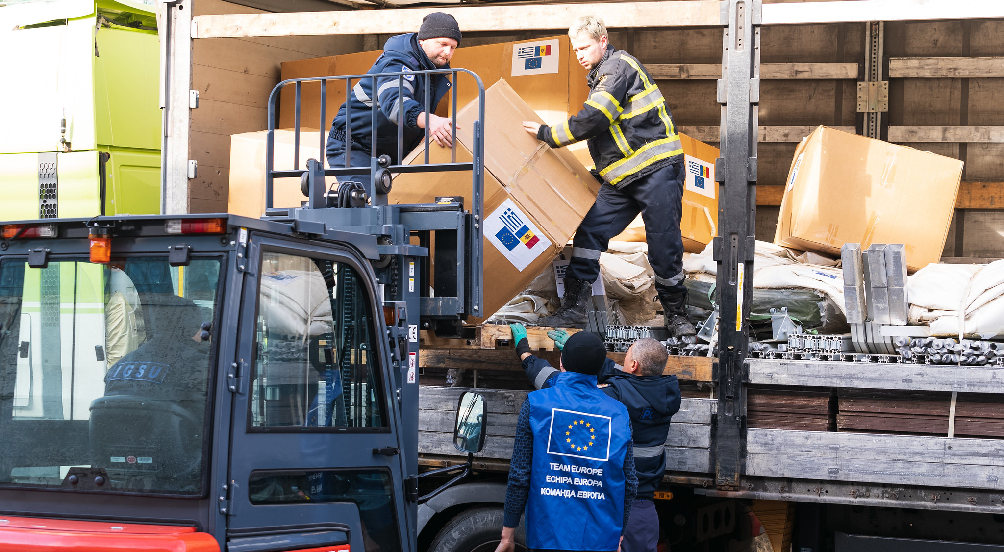 A forklift truck unloading goods.