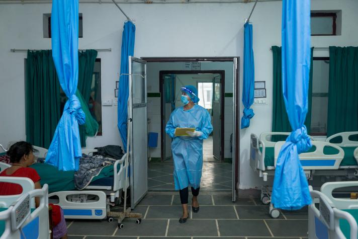 Nurse entering a hospital ward