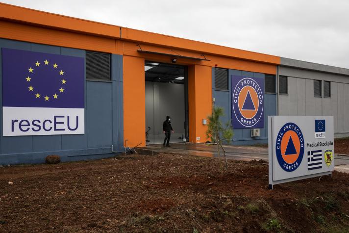 Outdoor view of a warehouse with rescEU logos on it.