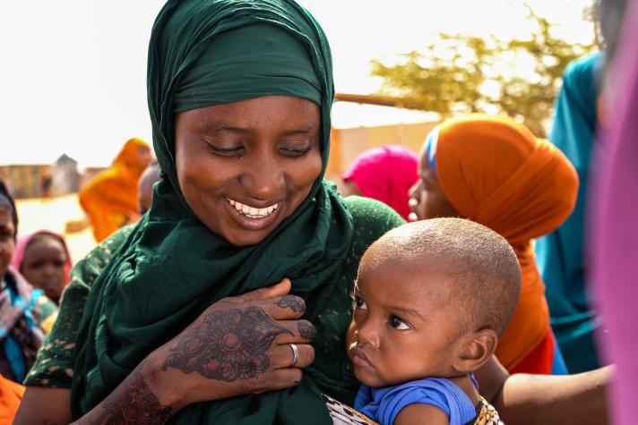 A mother and her child at the mobile health clinic in Galkayo, Somalia. 