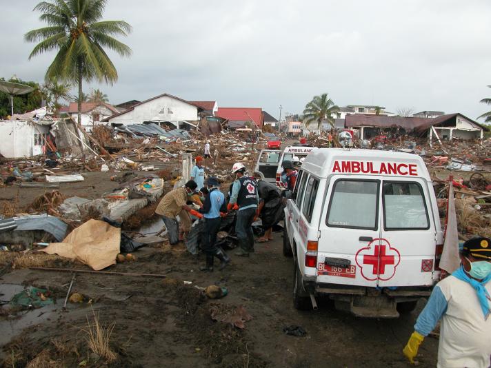 An ambulance arrives after the tsunami hit