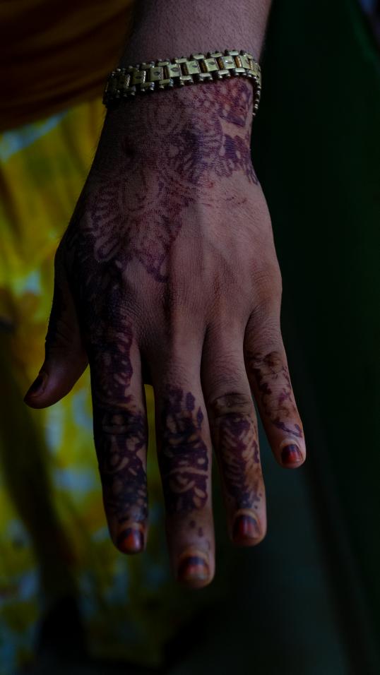 A with Hena painted hand