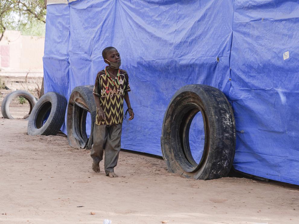 Issouf*, aged 7, arriving at an EU-funded temporary school set up by Save the Children. He had to escape the violence that displaced over 1.4 million people in Burkina Faso.  *Name has been changed. 