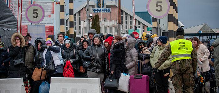 Ukrainian refugees arriving at the border between Poland and Ukraine 