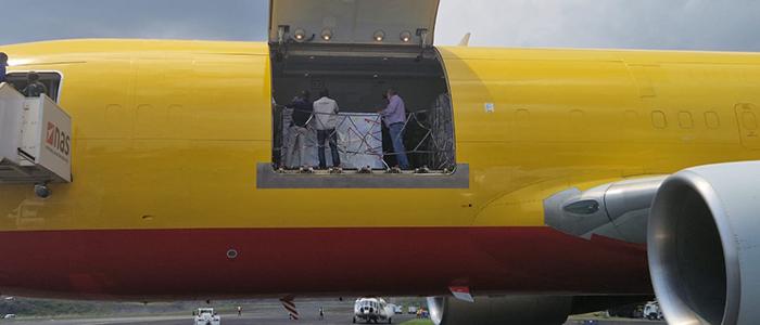 View of an open side door of a yellow plane