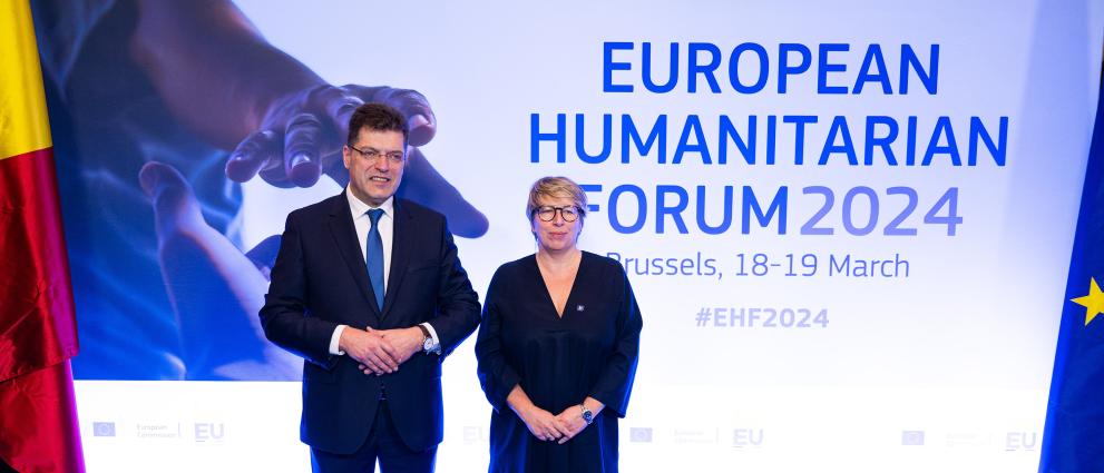 Commissioner for Crisis Management, Janez Lenarčič and Belgian Minister of Development Cooperation and of Major Cities, Caroline Gennez in front of the EHF visual.