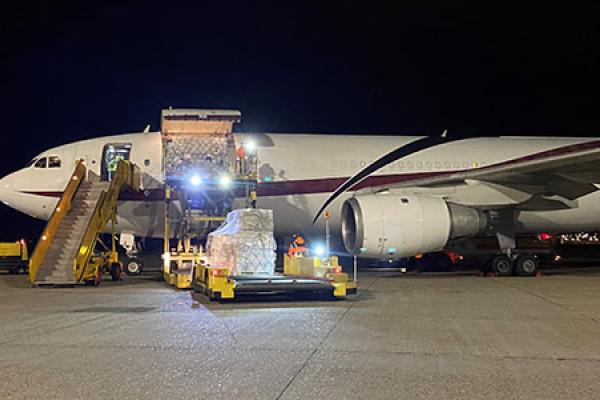 Cargo airplane being loaded