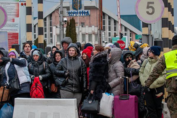 Ukrainian refugees arriving at the border between Poland and Ukraine 