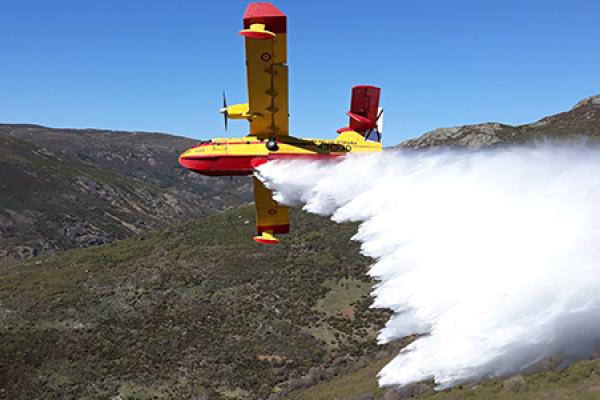 Wild fire plane over mountains